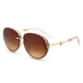 Chic gafas de sol ovaladas grandes degradadas para mujer con detalles de trébol dorados. - Montura Té Degradado Té