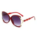 Occhiali da sole oversize rossi donna con lenti sfumate e dettagli metallici vista principale. - Rosso/Grigio