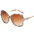 Große Damen Retro Sonnenbrille mit Leopardenmuster und funkelnden Strasssteinen. - Leopardenmuster Rahmen