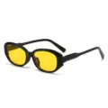 Retro schmale Katzenaugen-Sonnenbrille mit schwarzem Gestell und auffallend gelben Gläsern. - Schwarzer Rahmen Gelbe Gläser