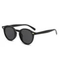 Retro black round frame sunglasses with chic gold dot details, stylish UV400 sun protection. - Black Frame Grey Lens