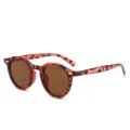 Retro round sunglasses featuring a red tortoiseshell frame and brown UV protection lenses. - Tortoiseshell Frame Tea Lens