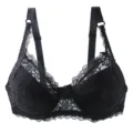 Detailed view of the black lace bra showing delicate floral patterns and adjustable straps. - 75D / Tops / Black