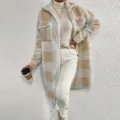 Detailed view of women's cozy fleece plaid coat featuring long sleeves and a stylish lapel. - S / Tops / Khaki