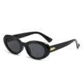 Gafas de sol ovaladas negras con detalle dorado en las patillas, montura gruesa retro variante - Montura Negra Lente Gris