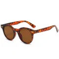 Retro Sonnenbrille mit Leopardenmuster, runden Gläsern und UV400 Schutz für Damen Herren. - Schildpatt Rahmen Tee Linse