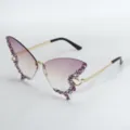 Detail shot of butterfly rhinestone sunglasses with gradient purple ocean lenses and chain temples. - Gradient Purple