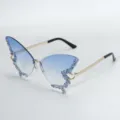 Exaggerated butterfly gradient blue rimless sunglasses with sparkling rhinestones and chic chain temples. - Gradient Blue
