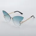 Trendy butterfly rimless gradient sunglasses with gold chain temples for street style. - Gradient Green