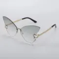 Detailed shot of trendy butterfly rimless sunglasses with gradient lenses and golden chain temples. - Gradient Cyan