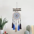 Handmade cotton rope dream catcher wall hanging with wooden sticks and tassels for room decor. - 9545D Tassel Dream Catcher