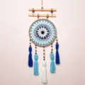 Handcrafted blue crochet dream catcher wall hanging with wooden sticks and tassels for room decor. - 9545 Tassel Dreamcatcher