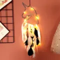 Detailed shot of the unicorn dream catcher wall hanging with glowing LED lights and soft feathers. - MS0171 with Light