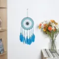 Attrape-rêves mural crocheté bleu fait main avec plumes pour décoration intérieure - Bleu