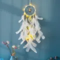White feather dreamcatcher wall hanging with warm LED fairy lights for cozy room decor. - 7033BCD White with Light