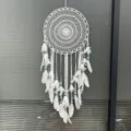 Handcrafted white dream catcher wall hanging with feathers and blue beads for home decor. - 0073A Size