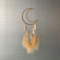 Crescent moon dreamcatcher pendant with feathers and tassels, perfect bedroom decor item. - MS9215N