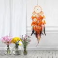 Acchiappasogni boho arancione in piume fatto a mano decorazione da parete in cotone - Cinque Anelli Arancione (6946)