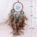 Acchiappasogni bohémien artigianale con piume e perline turchesi per decorazione murale - Stile 6044
