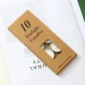 Pack of 10 tealight candles in kraft paper packaging with display window for home decor. - 10 Standard Candles (White)