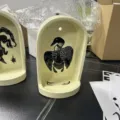 Resin wall niche altar decor with black animal pattern, retro arch sculpture for home wall. - Loon Stand