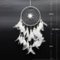 Handmade white dreamcatcher with feathers and wooden beads for wall hanging home decor. - 6960 White