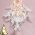 White feather dream catcher variant with warm fairy lights for cozy wall hanging decor. - MS7033BCD