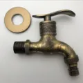 Antique zinc alloy carved garden faucet with decorative plate for outdoor mop use. - Antique Bronze Lucky Motif Handle