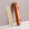 Orange plastic sushi bazooka maker kit with bamboo rolling mat for home kitchen DIY. - Striped Tube + Bamboo Curtain / Set / Orange