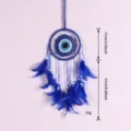 Attrape-rêves œil maléfique bleu tenture murale avec plumes et perles déco chambre - 9503 11 cm