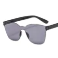 One-piece frameless sunglasses with grey lenses and black temples for daily UV protection. - Transparent Gray