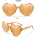 Modische herzförmige Sonnenbrille mit leuchtend gelben Gläsern und stilvollem transparentem Rahmen. - Gelber Rahmen Gelbe Gläser