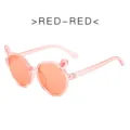 Gafas de sol rosadas lindas para niños con orejas de conejo montura redonda SKU - Marco Naranja Lente Naranja