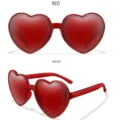 Stilvolle rote herzförmige Sonnenbrille für Damen, trendige Party-Sonnenbrille und Accessoire. - Roter Rahmen Rote Gläser