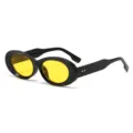 Modische schwarze ovale Sonnenbrille mit gelben Gläsern für Damen, trendiger Retro Eyewear Look. - Schwarzer Rahmen Gelbe Gläser