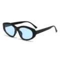 Retro Katzenauge Sonnenbrille für Damen und Herren mit schwarzem dickem Gestell. - Schwarzer Rahmen Blaue Gläser