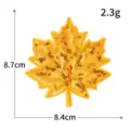 Toppa ricamata con foglia d'acero in paillettes dorate, accessorio di abbigliamento DIY. - M1545 giallo chiaro