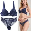 Deep blue lace sexy bra and panties set featuring floral patterns and cross strap design. - Blue