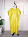 Detail view of the yellow satin caftan featuring exquisite square collar embroidery work. - One Size / Dresses / Lemon Yellow