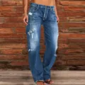 Close-up detail of distressed blue wash flare jeans showcasing vintage style texture. - S / Dark Blue