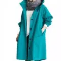 Turquoise women trench coat detail featuring hooded design, long sleeves and button closure. - Teal Blue