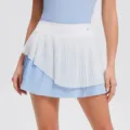 Detailed view of the layered pleated tennis skort with contrast blue and white design. - S / Blue