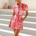 Pink and red printed stand collar short sleeve shirt and mini skirt two-piece resort set. - S / Pink Floral