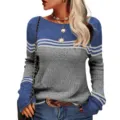 Detailed view of the blue and grey striped hollow-out knit sweater with long sleeves and crew neck. - Gray