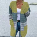 Detail view of the multi-color block knitted cardigan featuring textured stripe design. - S / Grass Green