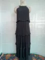 Vestido largo negro sin mangas con cuello halter y volantes, elegante prenda lisa de mujer. - S / Negro