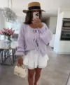 Detalle de cárdigan de punto morado suave con cuello redondo y lazos para un estilo dulce. - Púrpura