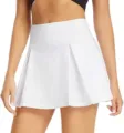 Detail view of the white athletic pleated tennis skirt, showcasing high waist and fabric texture. - XS / White