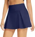 Detailed view of navy blue pleated sports skort for tennis, yoga, and fitness workout wear. - XS / Dark Blue