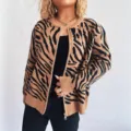 Detailed view of the stylish brown and black zebra print knit cardigan for women with zipper. - S / Tops / Khaki